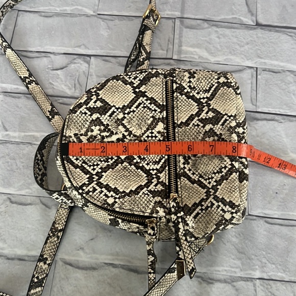 Steve Madden serpentine print small backpack - Picture 9 of 9